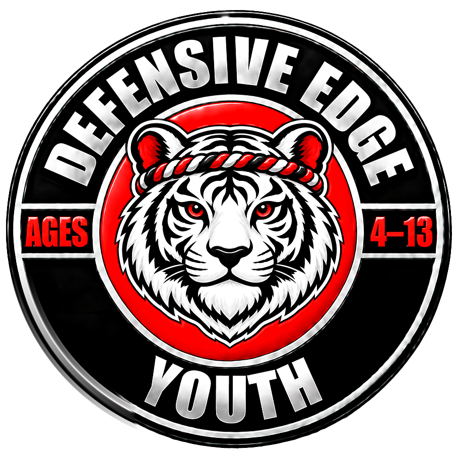 Defensive Edge Youth badge, a tiger in a Muay Thai headband, ages 4 to 13