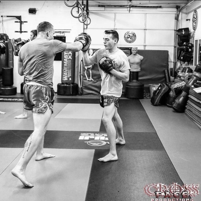Dave holds pads for Max