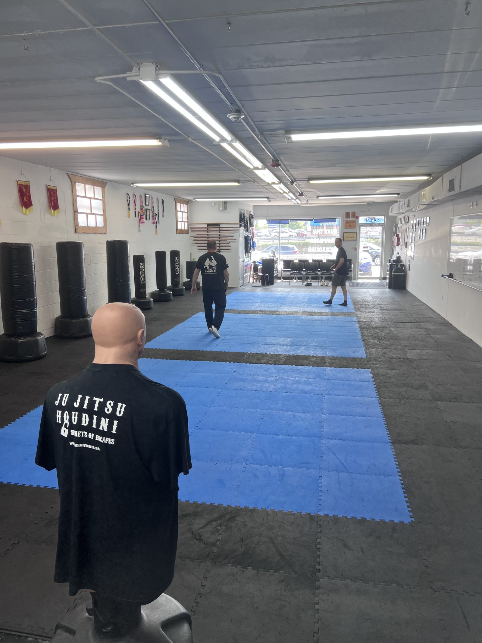 Students training on the mats at Defensive Edge