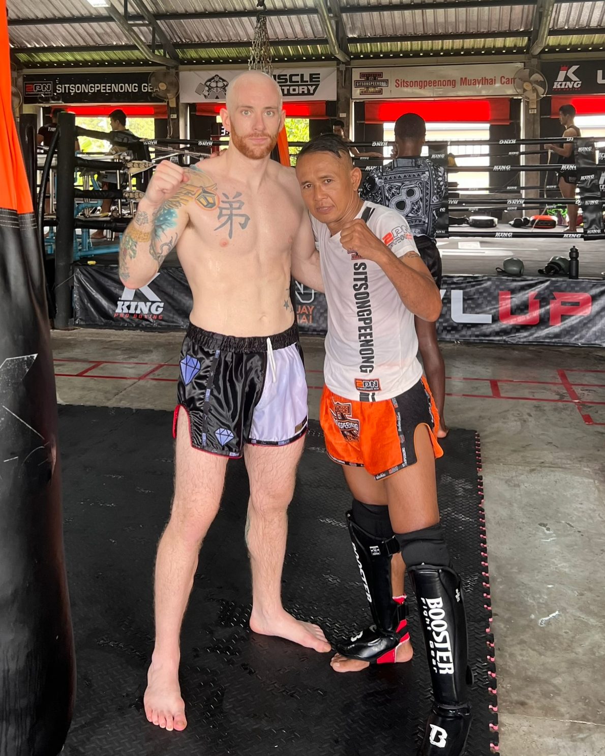 Dave with Kru Dam at Sitsongpeenong