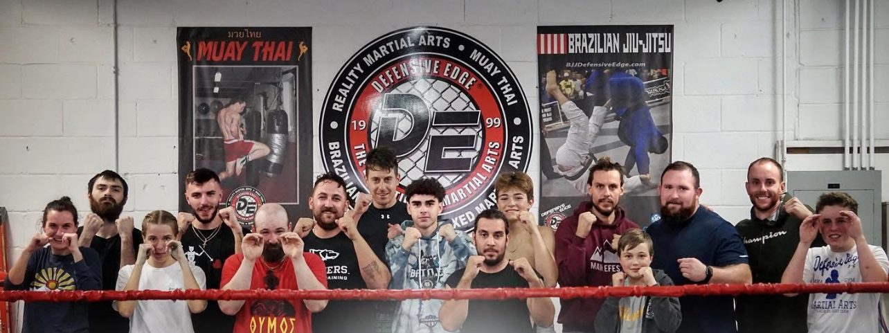 The Defensive Edge team in the ring