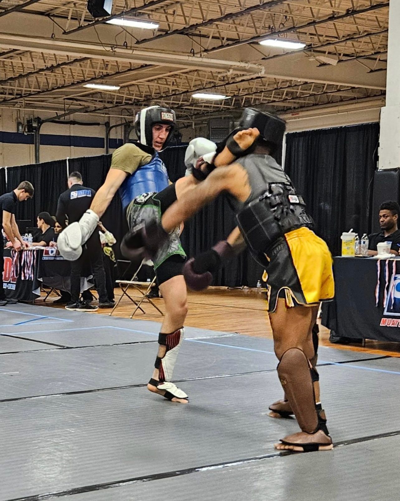 John Lennihan throws a head kick in competition